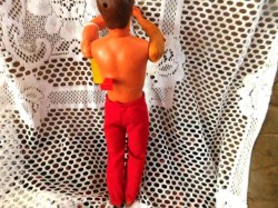 bionic man red pants back